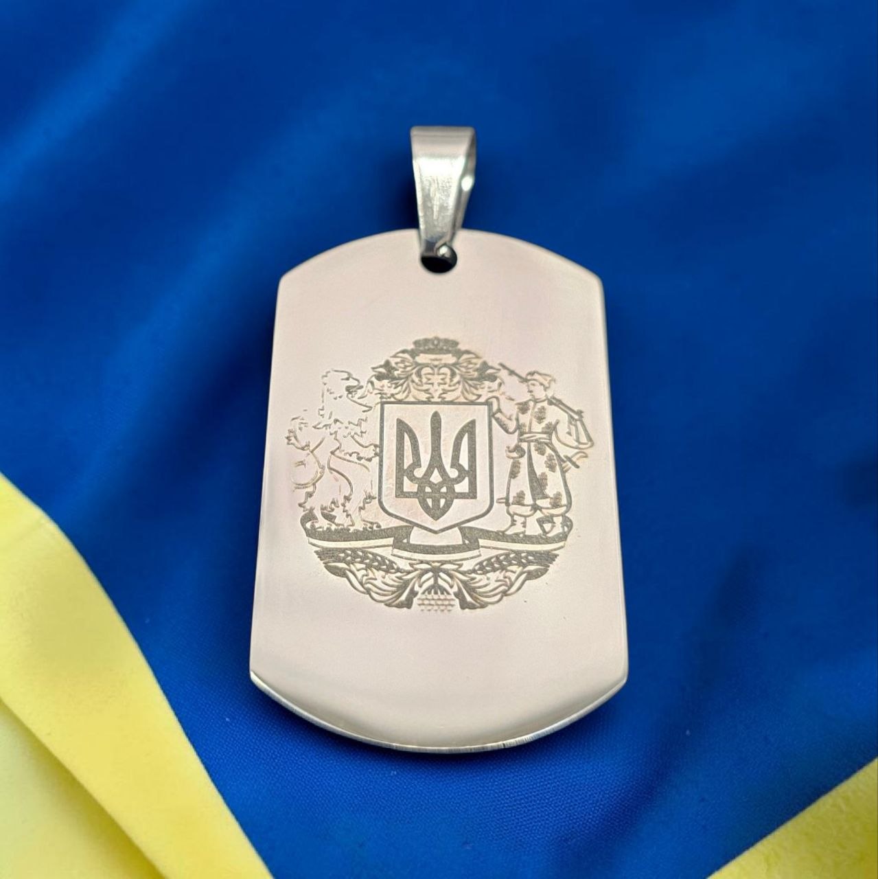 Гравіювання на металевому жетоні Гравіювання на металевому жетоні